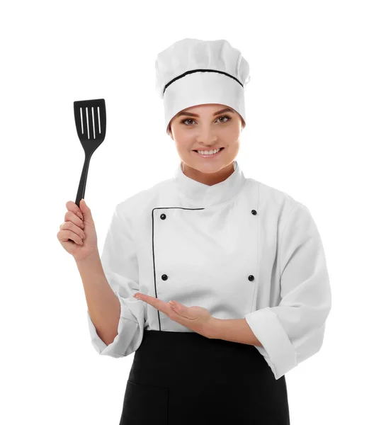 Vrouw chef-kok met spatel — Stockfoto