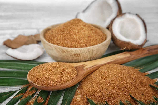 Brown sugar and coconuts — Stock Photo, Image