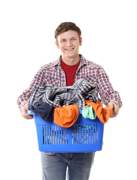 Happy man holding plastic box with clothes on white background — Stock Photo, Image