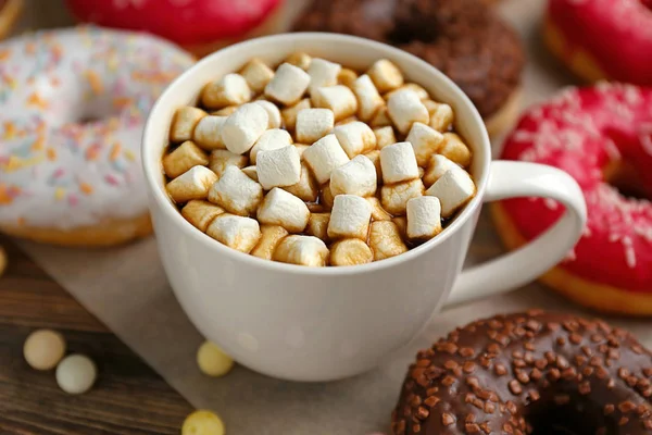 Tasty donuts with cup of coffee — Stock Photo, Image