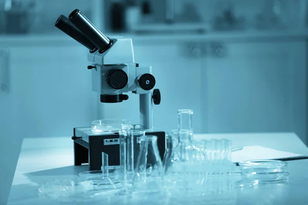 Microscope and test tubes — Stock Photo, Image