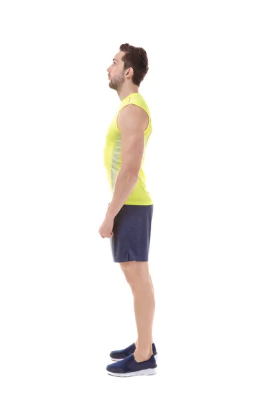 Concetto di postura errato. Uomo in abbigliamento sportivo isolato su bianco — Foto Stock