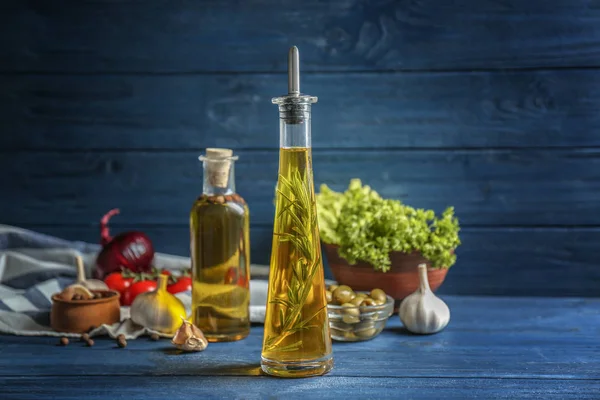 Olive oil and some spices — Stock Photo, Image