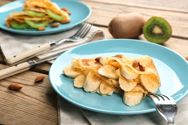 Blue plate with delicious pancakes — Stock Photo, Image