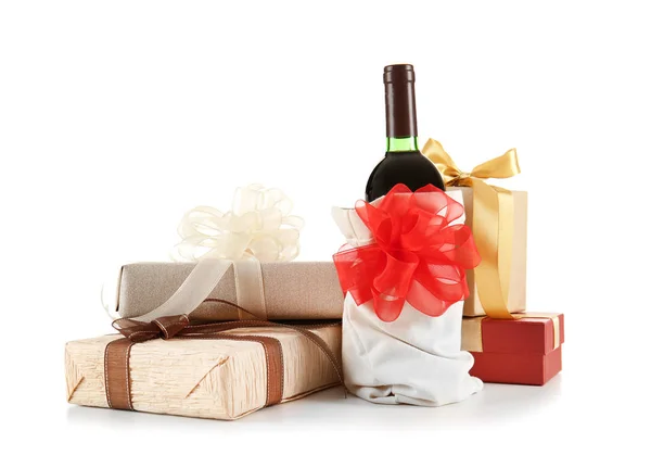 Decorated wine bottle and gift boxes — Stock Photo, Image