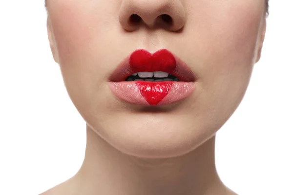 Gyönyörű fiatal nő, festett ajkak a szív — Stock Fotó