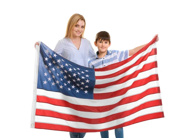 Happy mother with son holding American flag on white background Stock Photo