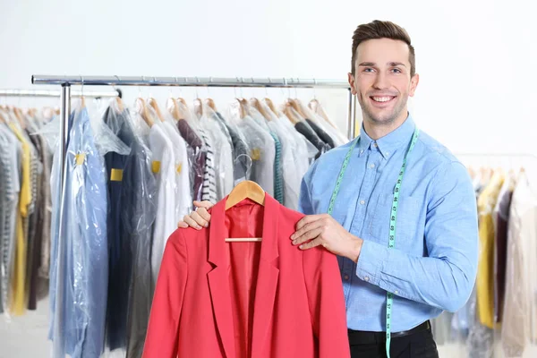 Worker in dry-cleaning salon — Stock Photo, Image