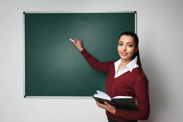 Beautiful young teacher — Stock Photo, Image