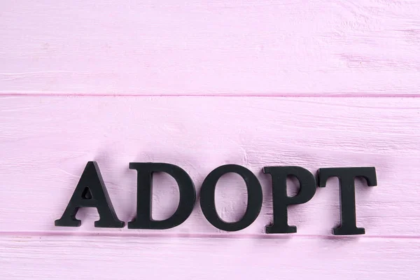 Wort Adoption aus Buchstaben — Stockfoto