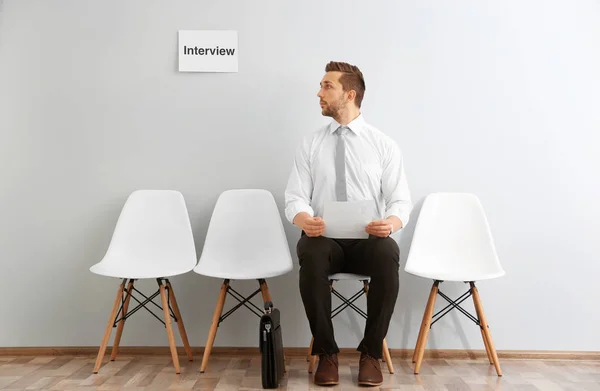 man waiting for interview