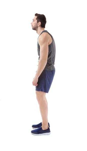Concepto de postura incorrecto. Hombre en ropa deportiva aislado en blanco —  Fotos de Stock