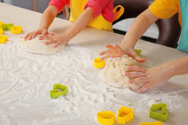 Little children making dough — Stock Photo, Image