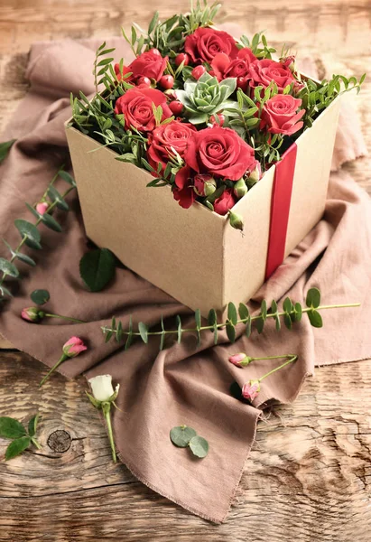 Beautiful flowers in gift box — Stock Photo, Image