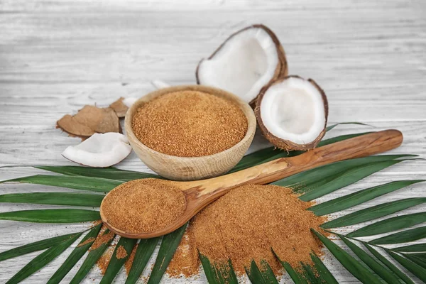 Brown sugar and coconuts — Stock Photo, Image