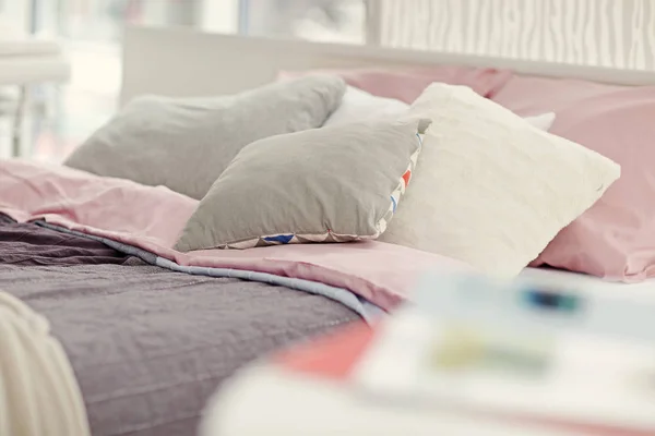 Bed with soft pillows — Stock Photo, Image
