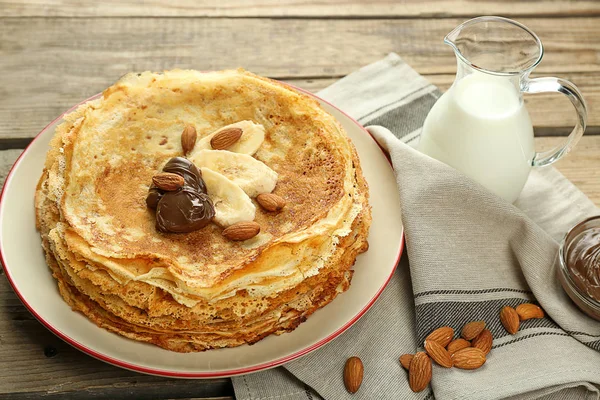 Delicious pancakes with banana and chocolate — Stock Photo, Image