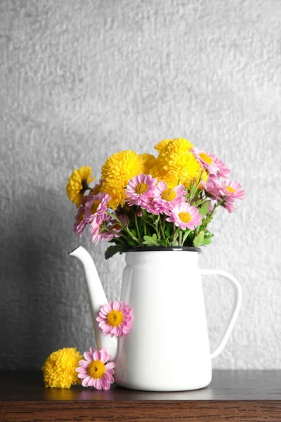 Beautiful bouquet of flowers in kettle — Stock Photo, Image