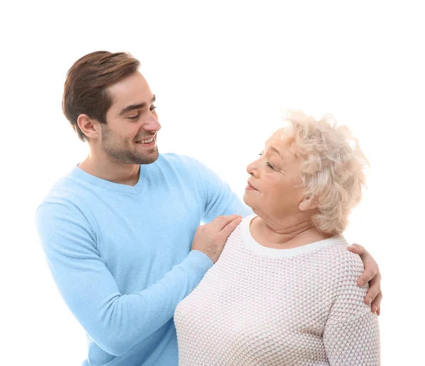 Young man with grandmother on white background — Stock Photo, Image