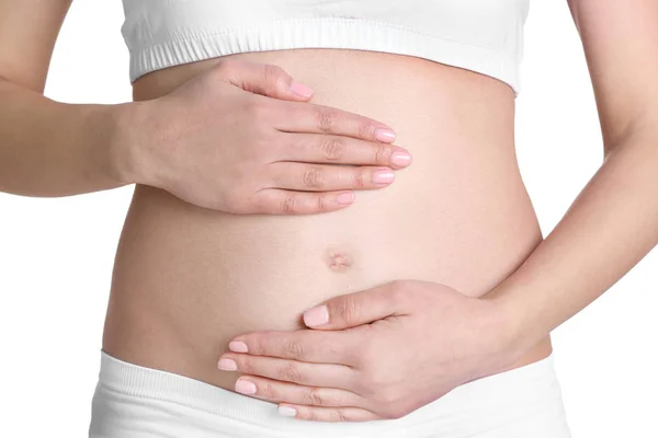 Mujer embarazada en blanco — Foto de Stock