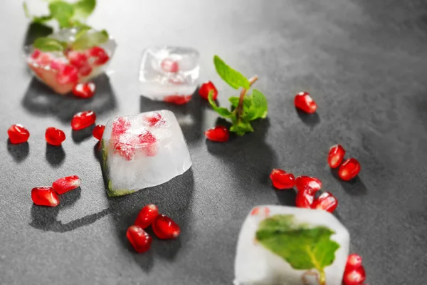 Ice with pomegranate seeds — Stock Photo, Image