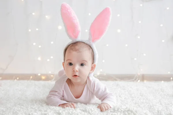 Baby with bunny ears — Stock Photo, Image