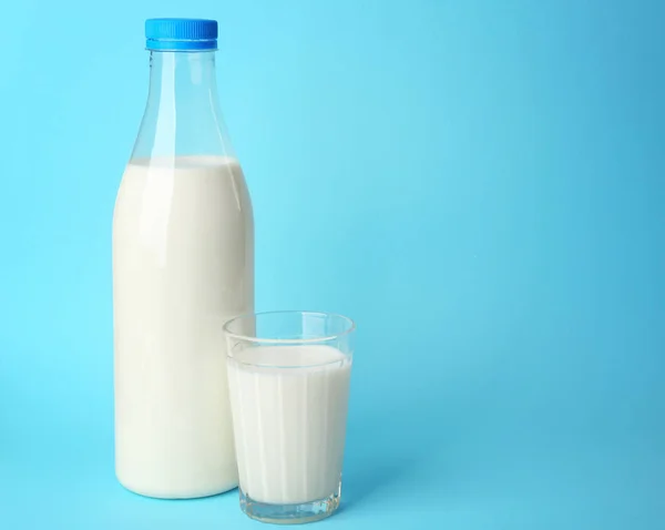 Bottle of tasty milk with glass — Stock Photo, Image