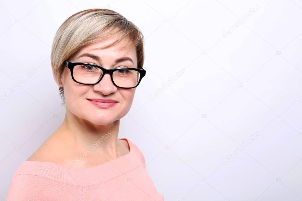 Mature woman wearing glasses 