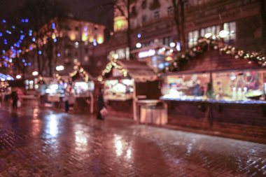 Gece, şehir içinde adil Noel bulanık arka plan