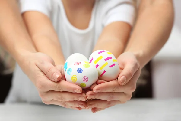 Mother and child holding  eggs — Stock Photo, Image