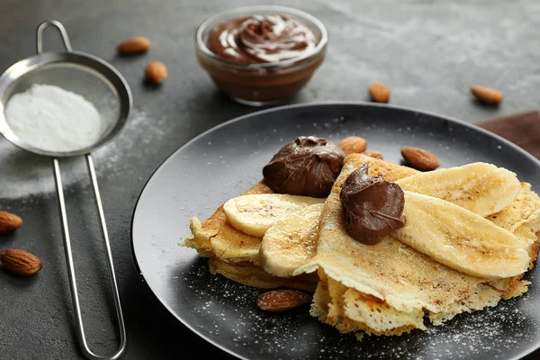 Pancakes with banana and chocolate — Stock Photo, Image