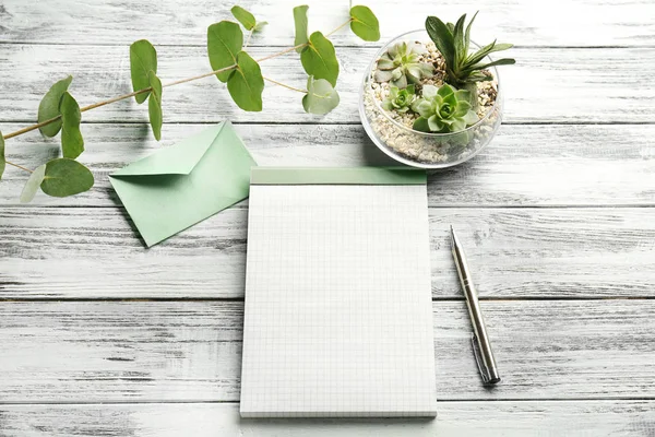 Blank notepad and succulents — Stock Photo, Image