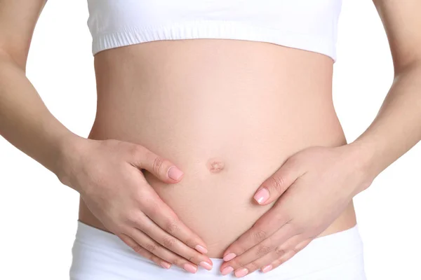 Mulher grávida em branco — Fotografia de Stock