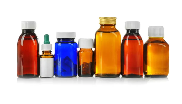 Бутылки с лекарствами и таблетками — стоковое фото