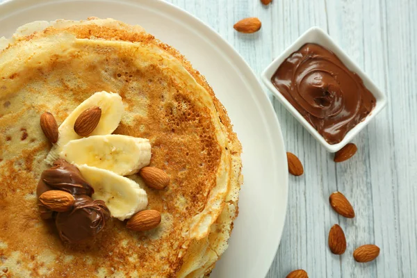 Delicious pancakes with banana and chocolate — Stock Photo, Image