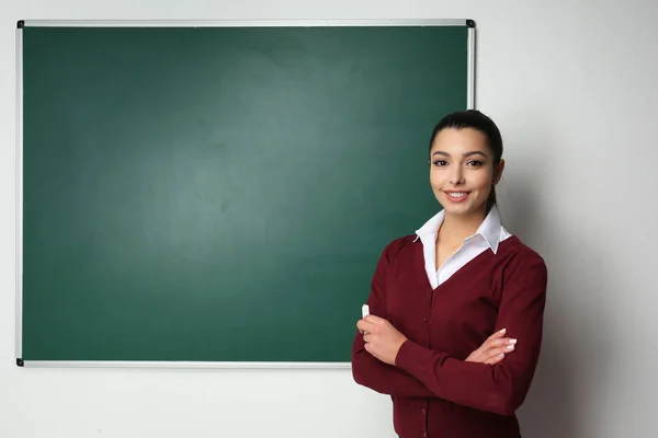 Beautiful young teacher — Stock Photo, Image