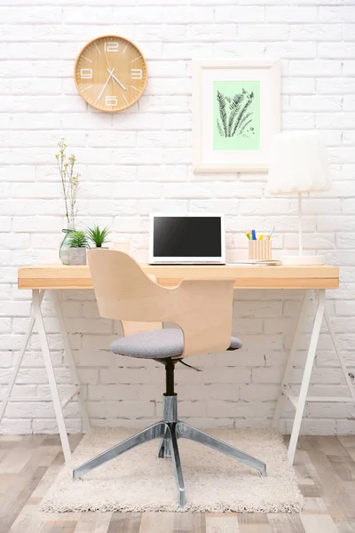 Workplace with laptop on desk — Stock Photo, Image