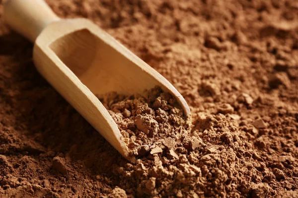 Trä scoop på kakao — Stockfoto