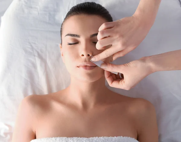 Kozmetikus depilating női arc — Stock Fotó