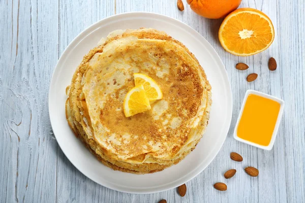 Stack of delicious pancakes with orange — Stock Photo, Image