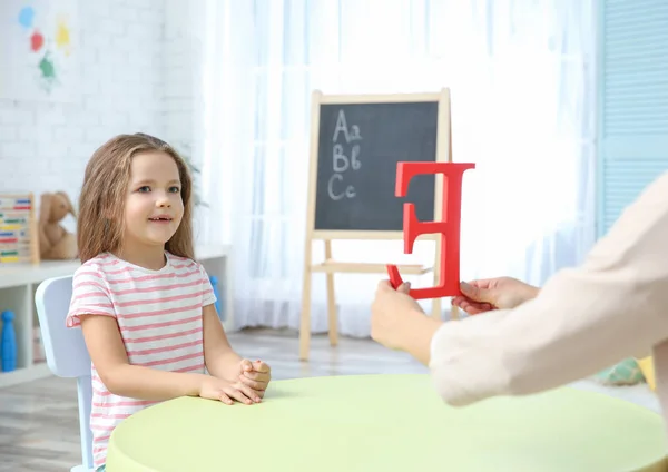 Little girl with teacher on private lesson — Stock Photo, Image