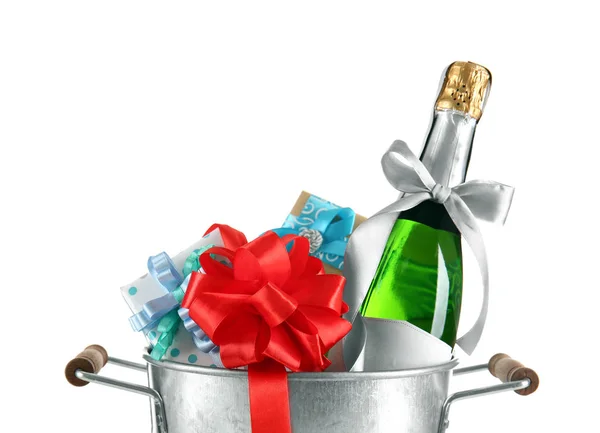 Champagne bottle and gift boxes — Stock Photo, Image