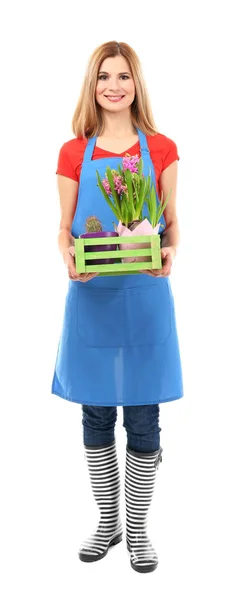 Beautiful female florist \ — Stockfoto