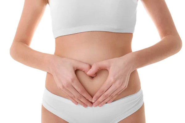 Young woman with hands on her belly — Stock Photo, Image