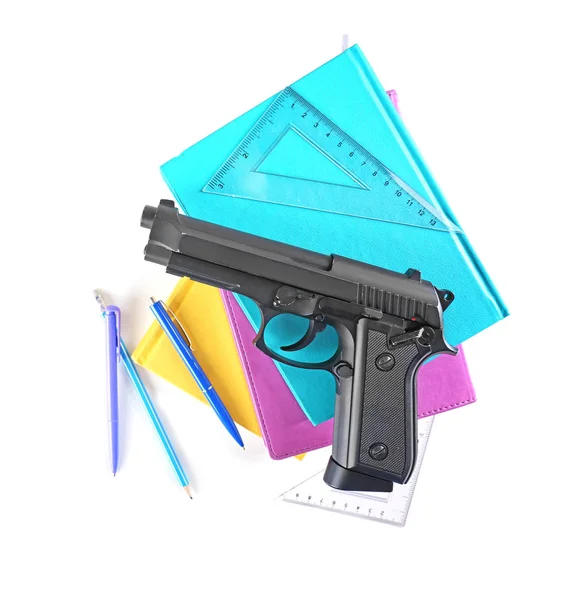 School stationery and gun isolated on white — Stock Photo, Image