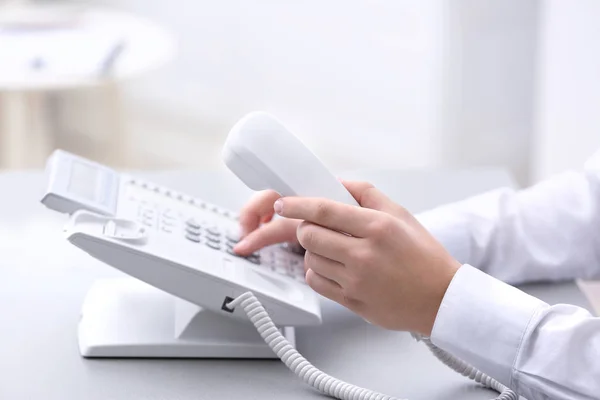 Man dialing telephone number — Stock Photo, Image