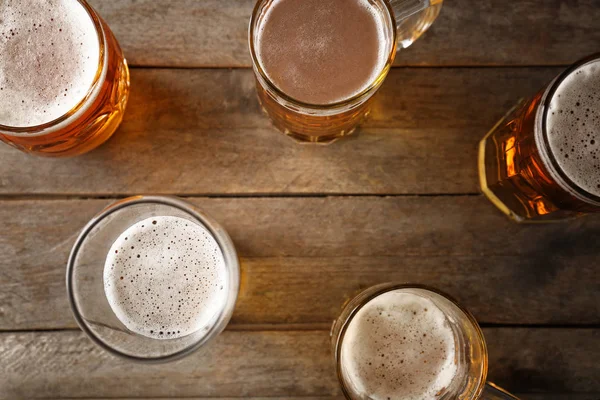 Mugs with cold beer — Stock Photo, Image