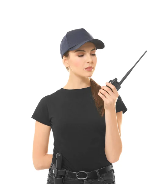 Mooie jonge vrouw in veiligheid uniform op witte achtergrond — Stockfoto