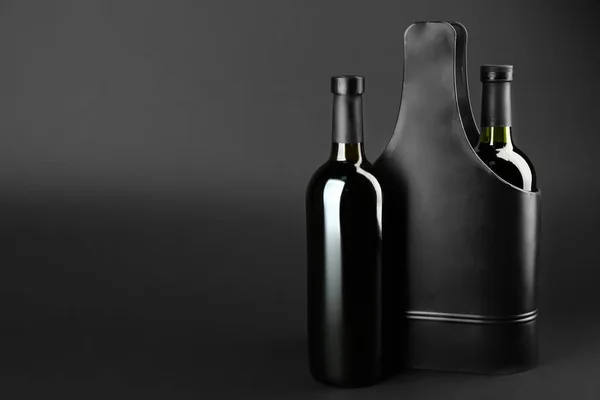 Wine bottles and black gift box — Stock Photo, Image