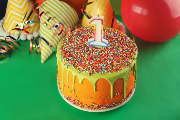 Tasty birthday cake with candle — Stock Photo, Image